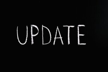 Image of the word update written on a chalkboard