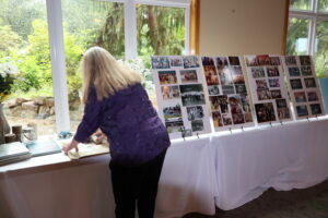 Robin Cooley working on memorabilia